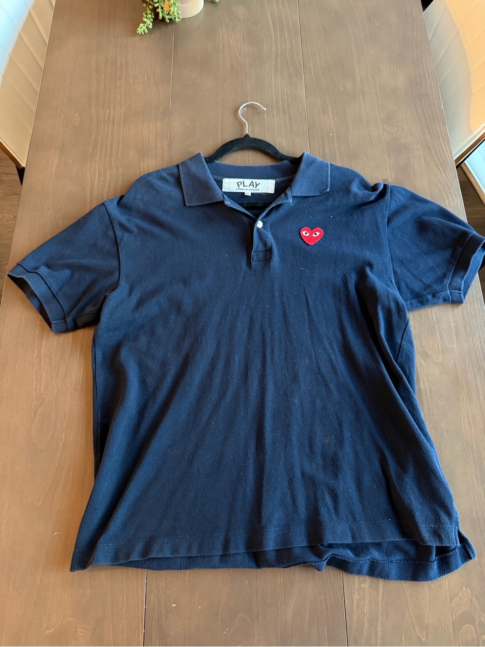 Comme des Garcons PLAY Navy Polo with Red Heart Patch